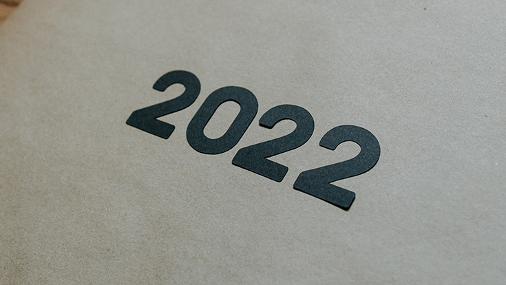 2020 written in paper letter against a wooden background